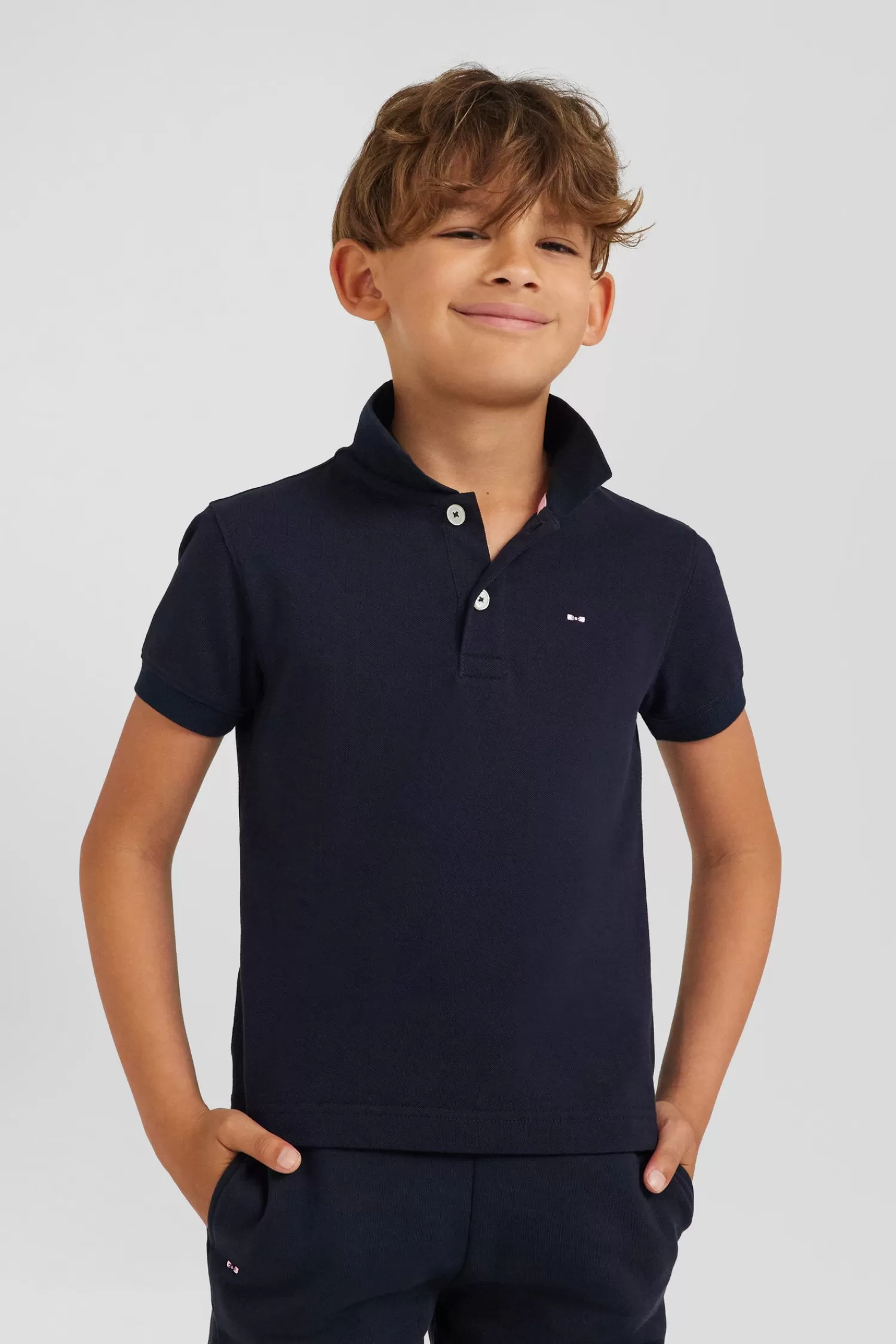 Eden Park Regular navy blue short-sleeved cotton piqué polo shirt with back bow tie embroidery<Kids Kids